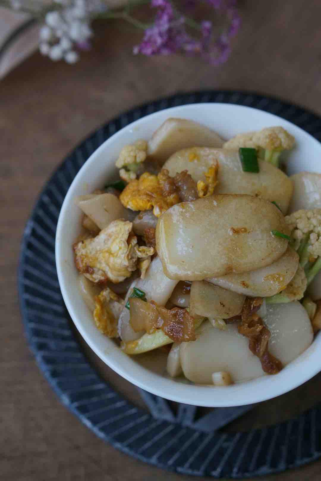 油渣花菜炒年糕的做法-家常味炒菜譜